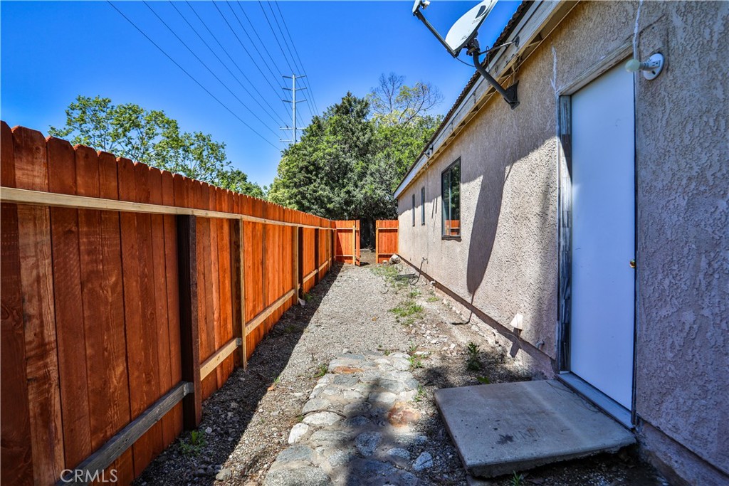 2003 Springcreek Circle Upland, CA 91784 - Photo 52 of 64 a view of balcony with wooden floor and potted plants