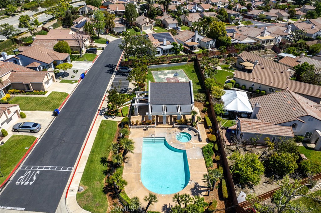 2003 Springcreek Circle Upland, CA 91784 - Photo 57 of 64 an aerial view of a house with a swimming pool a yard and plants