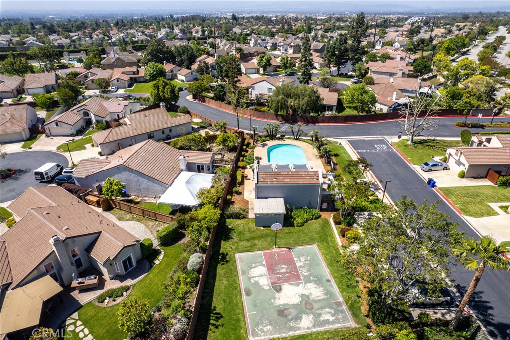 2003 Springcreek Circle Upland, CA 91784 - Photo 58 of 64 an aerial view of a house with a swimming pool