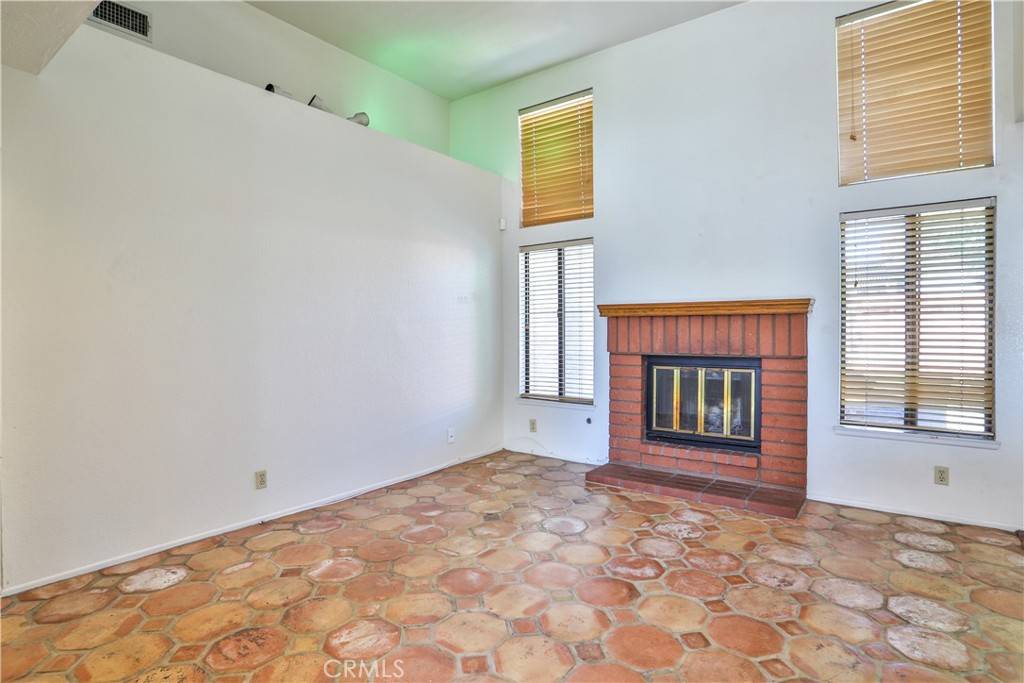 2003 Springcreek Circle Upland, CA 91784 - Photo 9 of 64 a view of empty room with a fireplace
