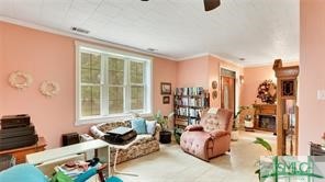 1979 South Coastal Highway Riceboro, GA 31323 - Photo 9 of 48 As you enter the house, there is a formal living a