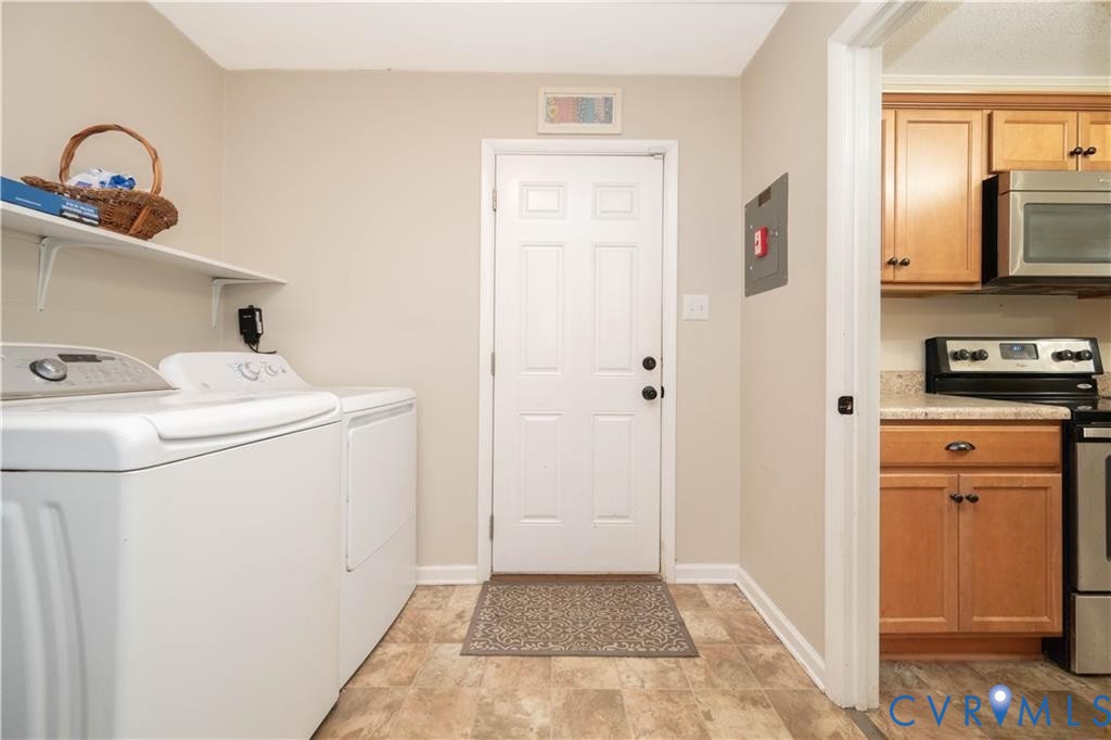 9910 Husting Court Chesterfield, VA 23832 - Photo 14 of 19 a utility room with dryer and washer