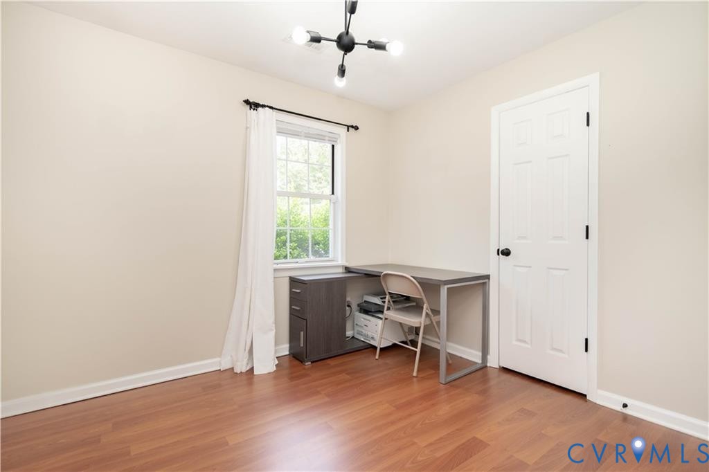 9910 Husting Court Chesterfield, VA 23832 - Photo 5 of 19 a view of a workspace with furniture and a window