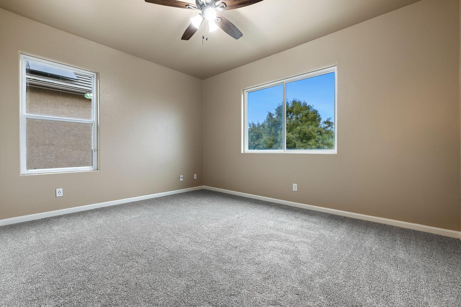4674 North Arrow Ridge Way Clovis, CA 93619 - Photo 41 of 77 a view of an empty room with a window