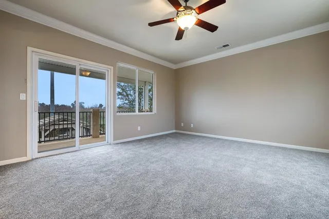 a front view of a house with a yard and porch