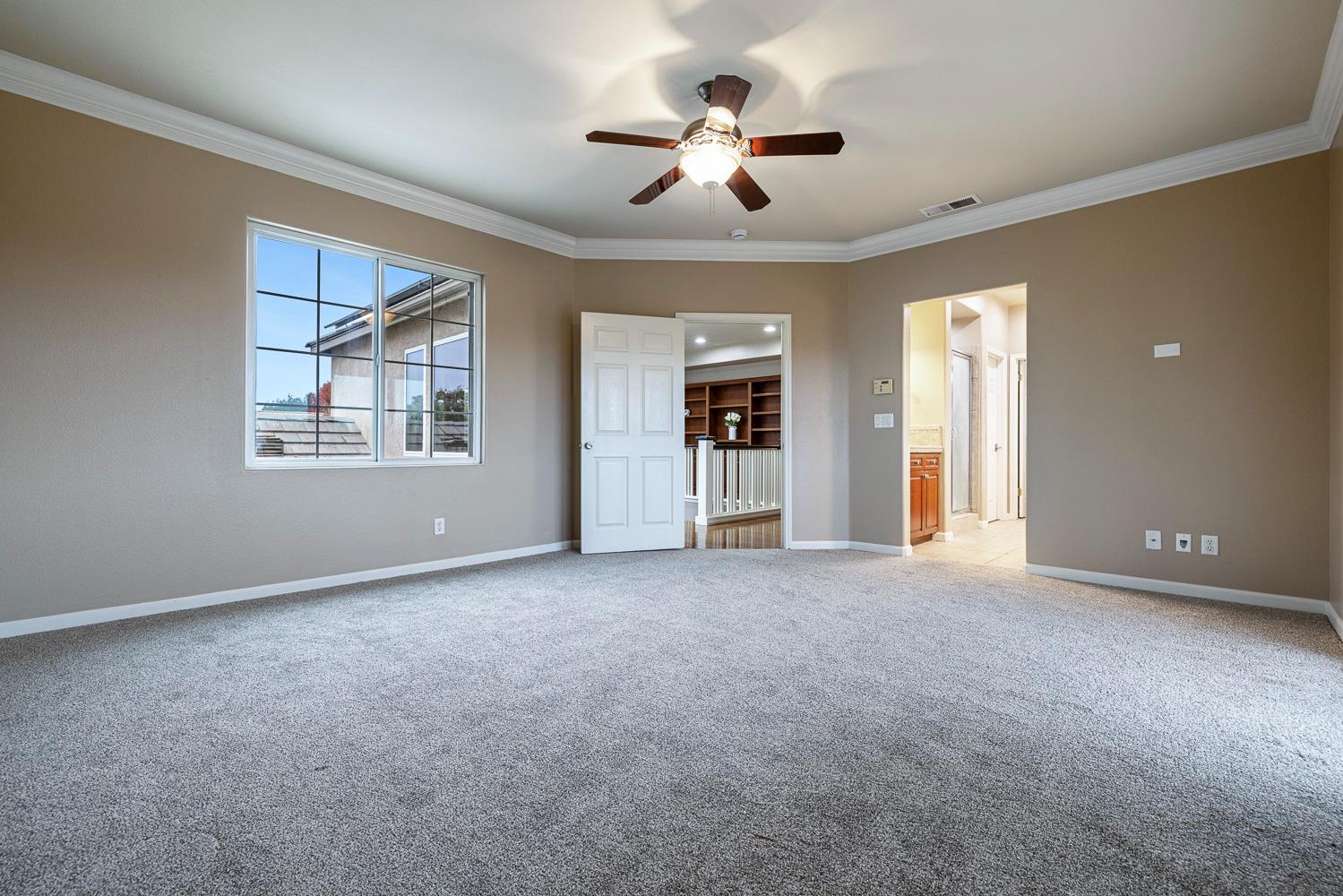 4674 North Arrow Ridge Way Clovis, CA 93619 - Photo 46 of 77 a view of an empty room with a window