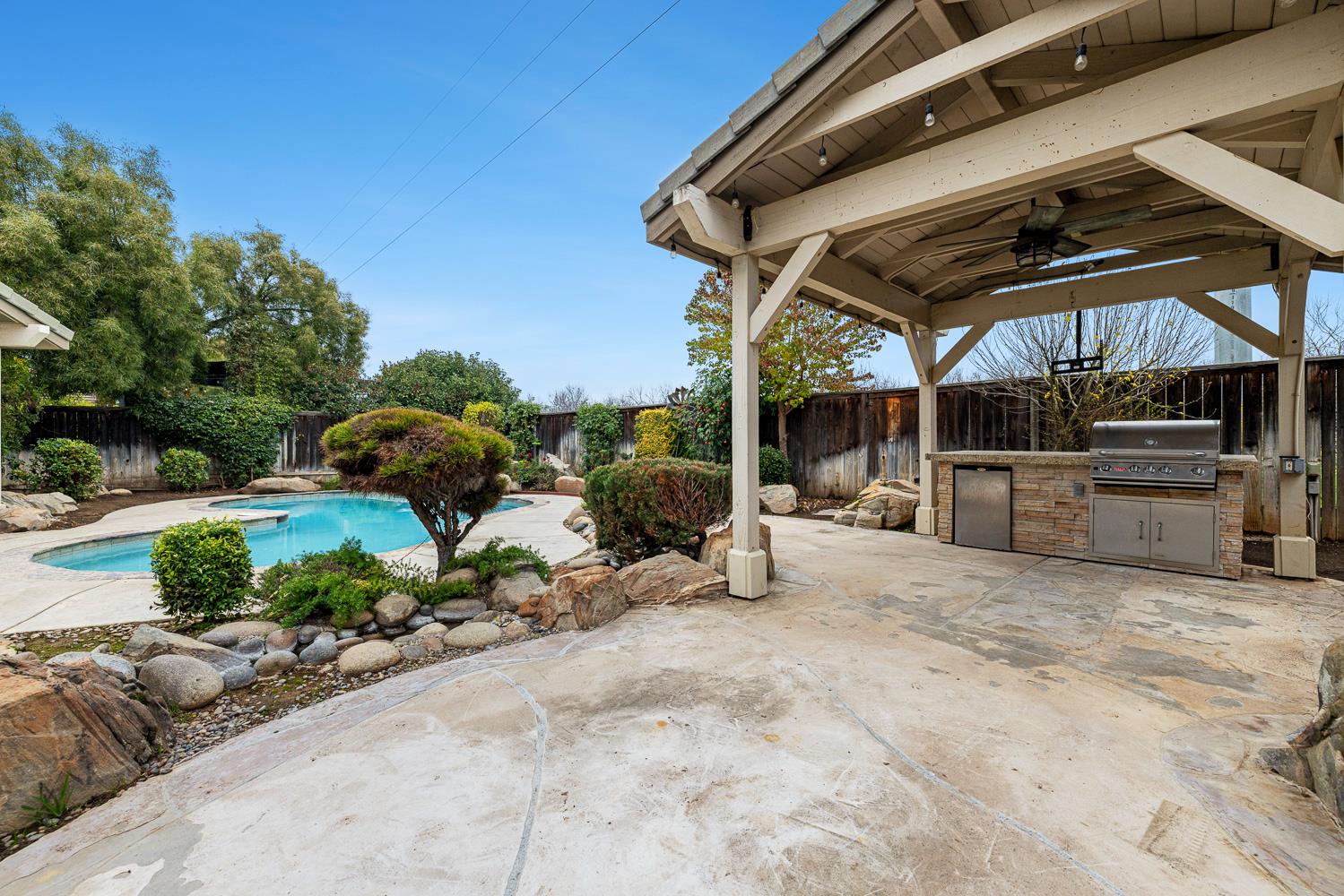 4674 North Arrow Ridge Way Clovis, CA 93619 - Photo 60 of 77 a view of a backyard