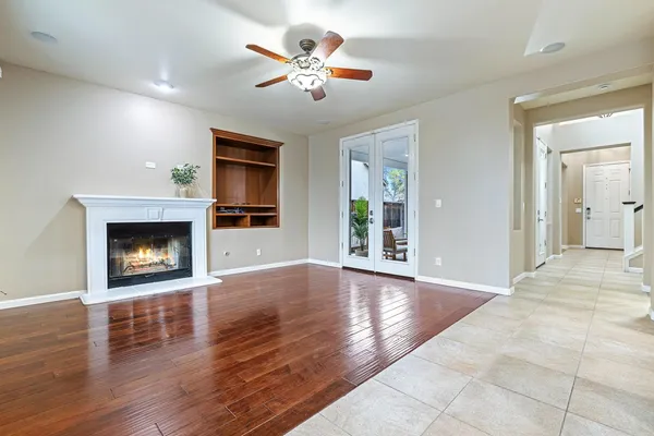 a view of an entryway with wooden floor