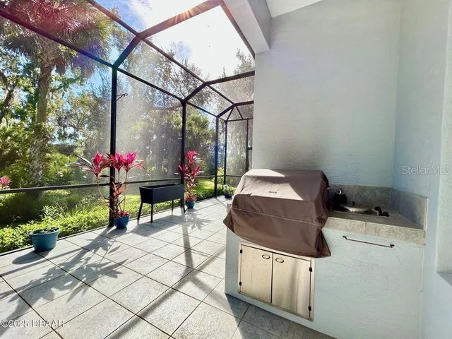 a bathroom with a sink a mirror and a shower