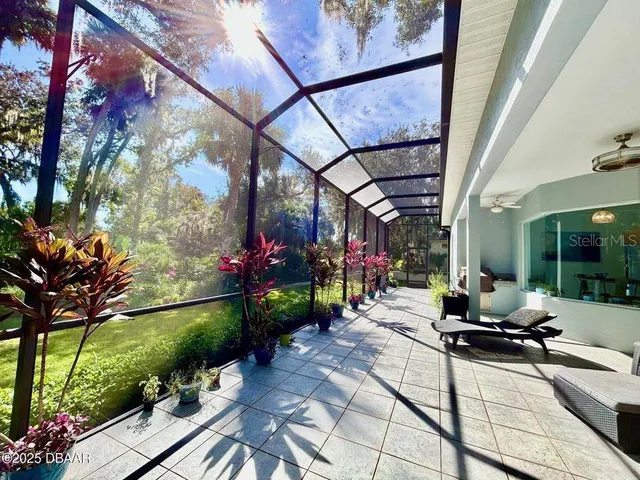 a bathroom with a double vanity sink mirror and bathtub