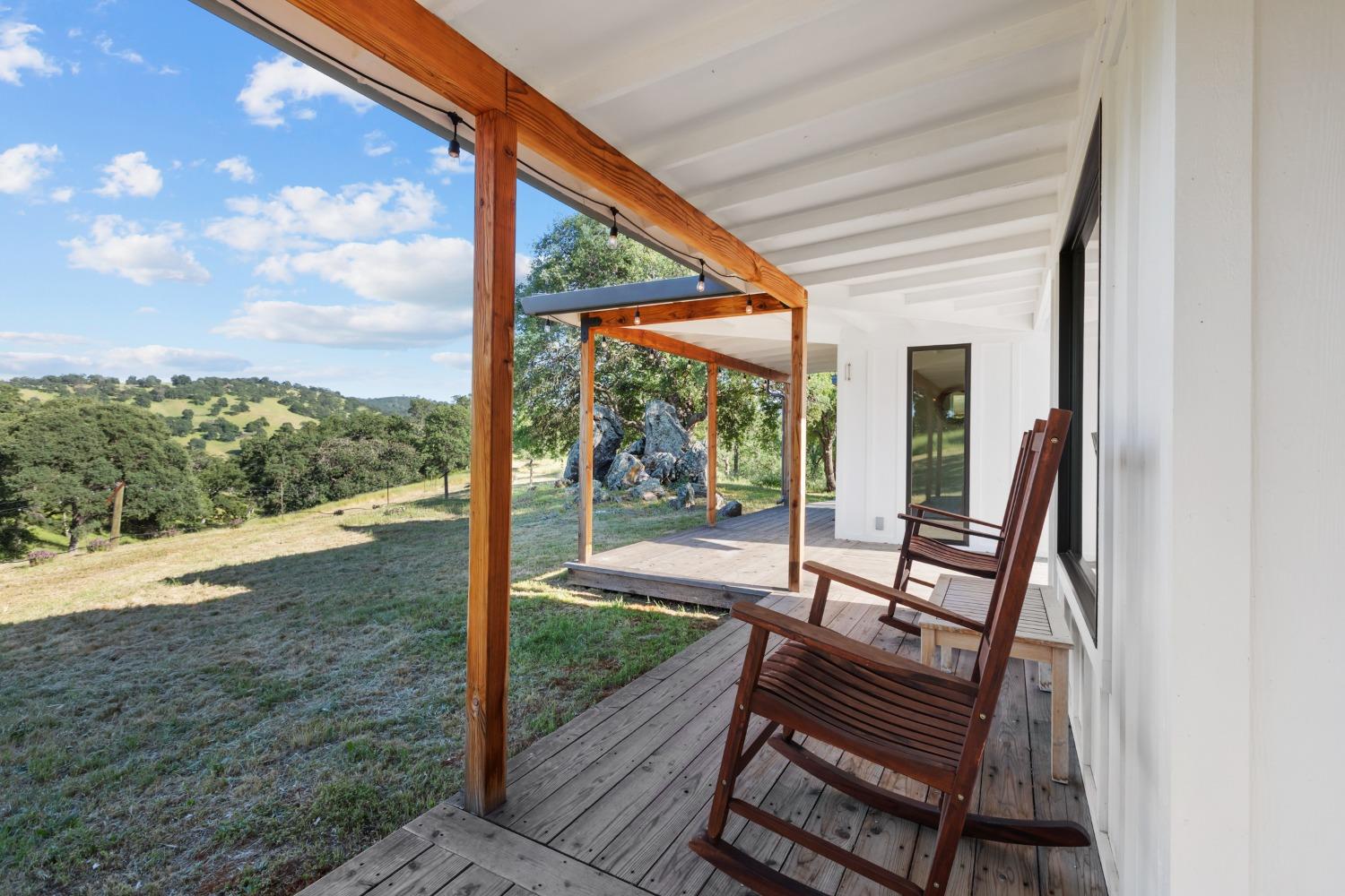 14883 Vaira Ranch Road Drytown, CA 95699 - Photo 22 of 60 a view of a two chair in the balcony