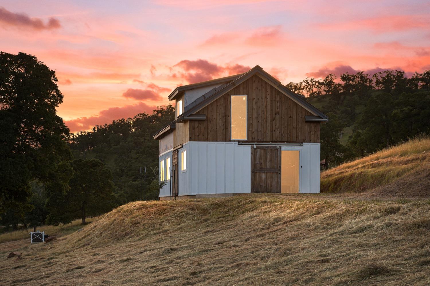 14883 Vaira Ranch Road Drytown, CA 95699 - Photo 26 of 60 a front view of a house with a yard