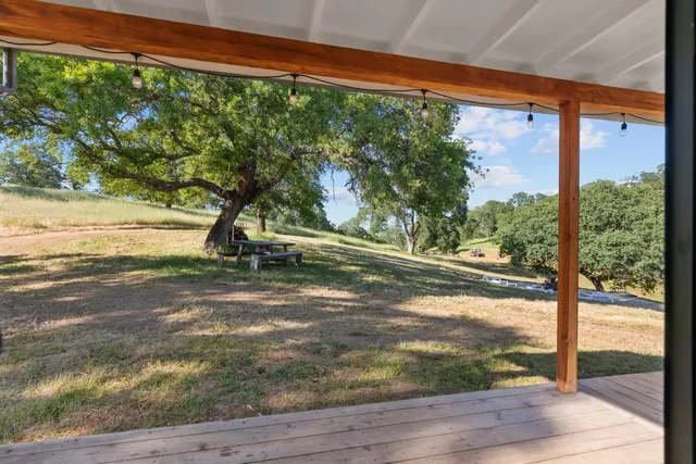 an aerial view of residential house with outdoor space