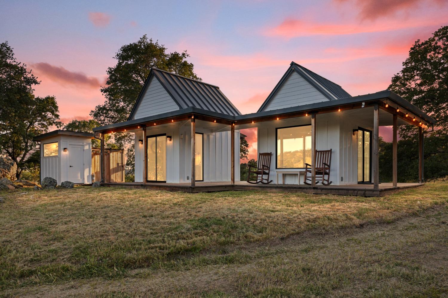 14883 Vaira Ranch Road Drytown, CA 95699 - Photo 7 of 60 a front view of a house with a yard