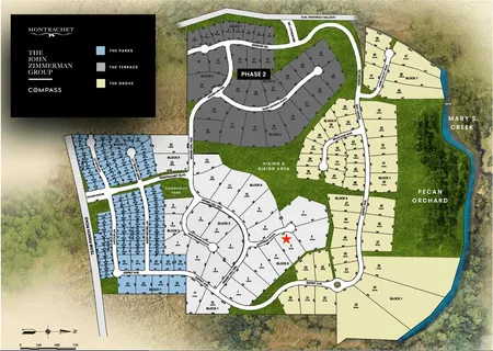 an aerial view of a residential houses with yard