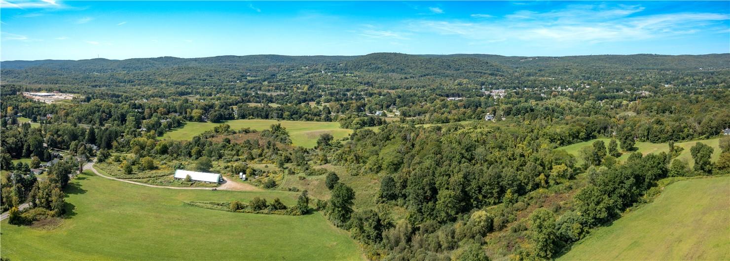 57 Quaker Hill Road Pawling, NY 12564 - Photo 19 of 20 a view of a lake with mountains in the background