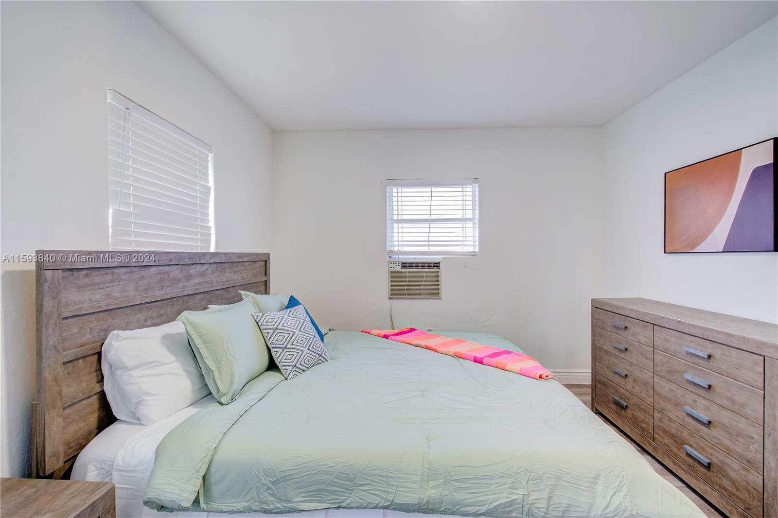 855 Southwest 7th Street Miami, FL 33130 - Photo 17 of 59 a bedroom with a bed and a window