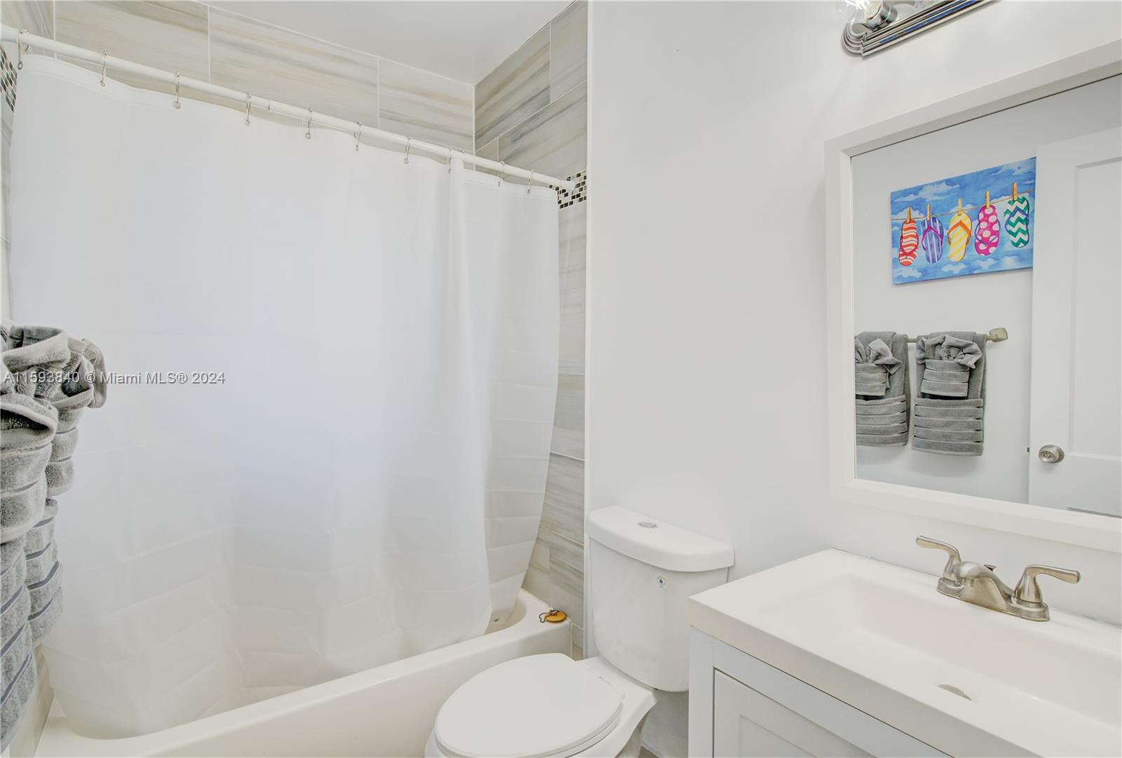 855 Southwest 7th Street Miami, FL 33130 - Photo 19 of 59 a bathroom with a sink toilet and shower