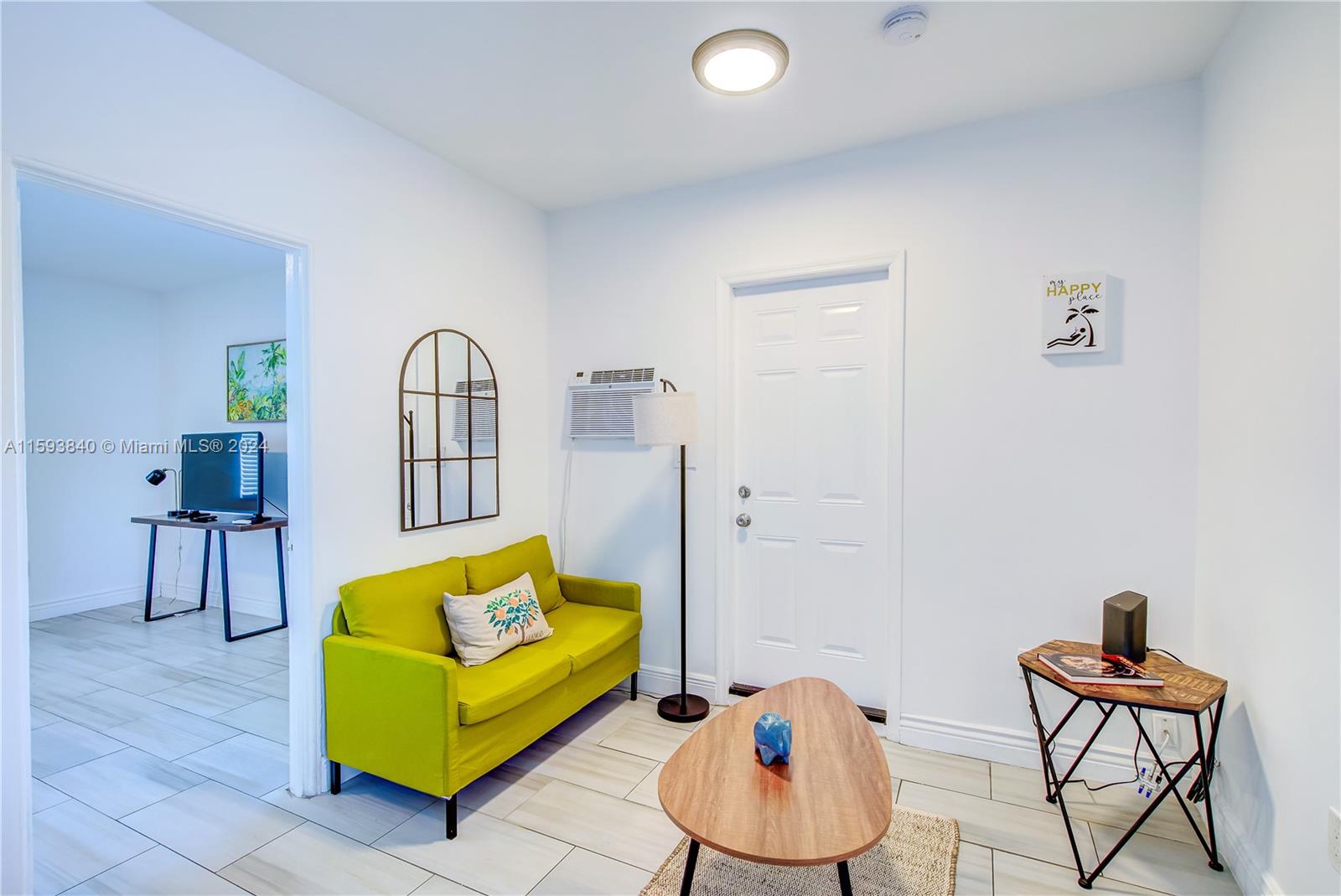 855 Southwest 7th Street Miami, FL 33130 - Photo 22 of 59 a living room with furniture and a table