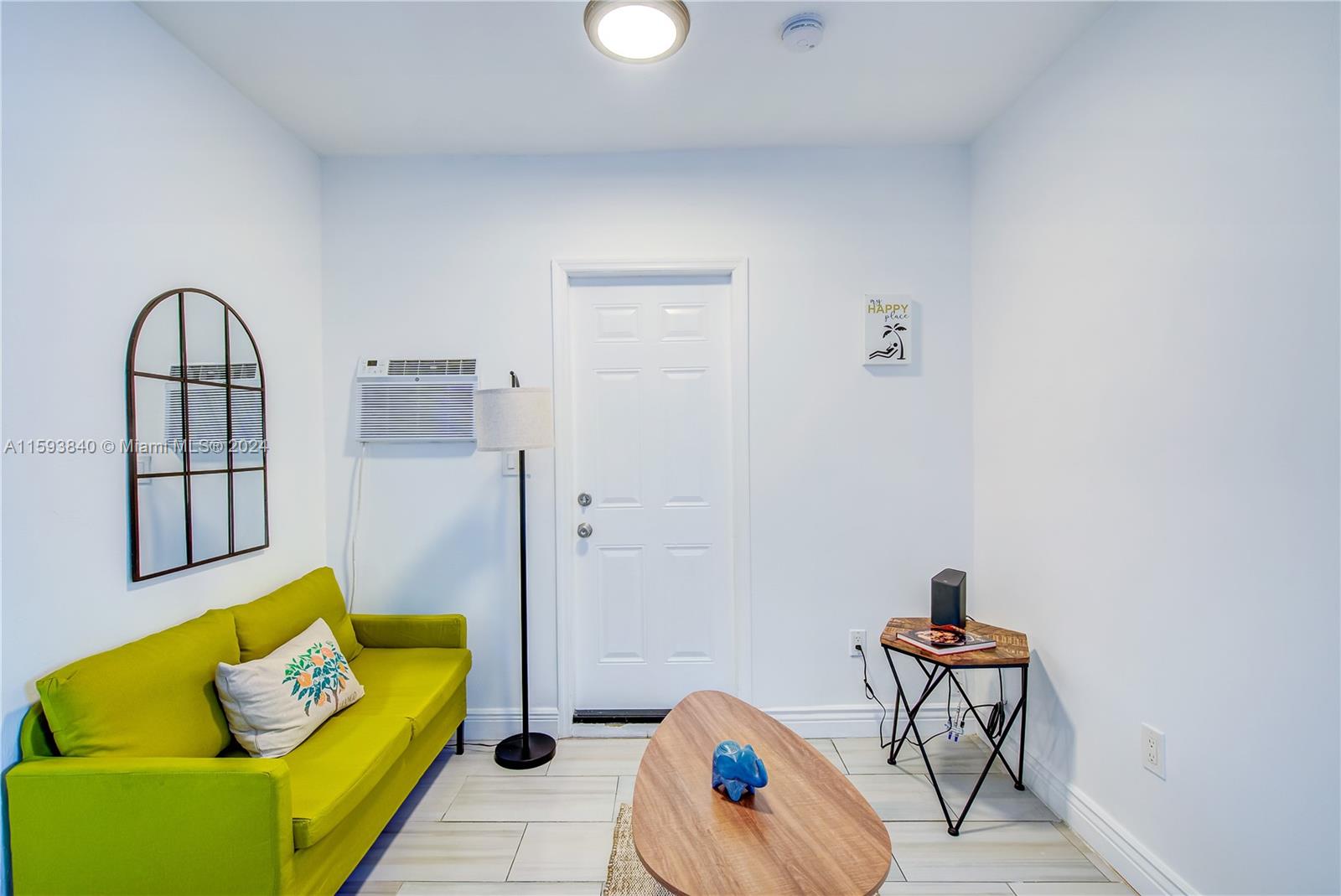 855 Southwest 7th Street Miami, FL 33130 - Photo 23 of 59 a living room with furniture and a window