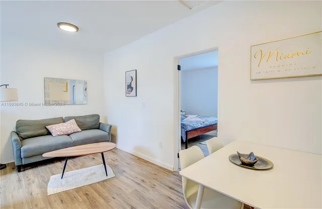 a bathroom with a bathtub and a sink