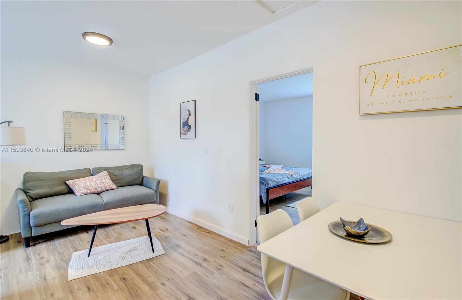 855 Southwest 7th Street Miami, FL 33130 - Photo 37 of 59 a living room with furniture and a wooden floor