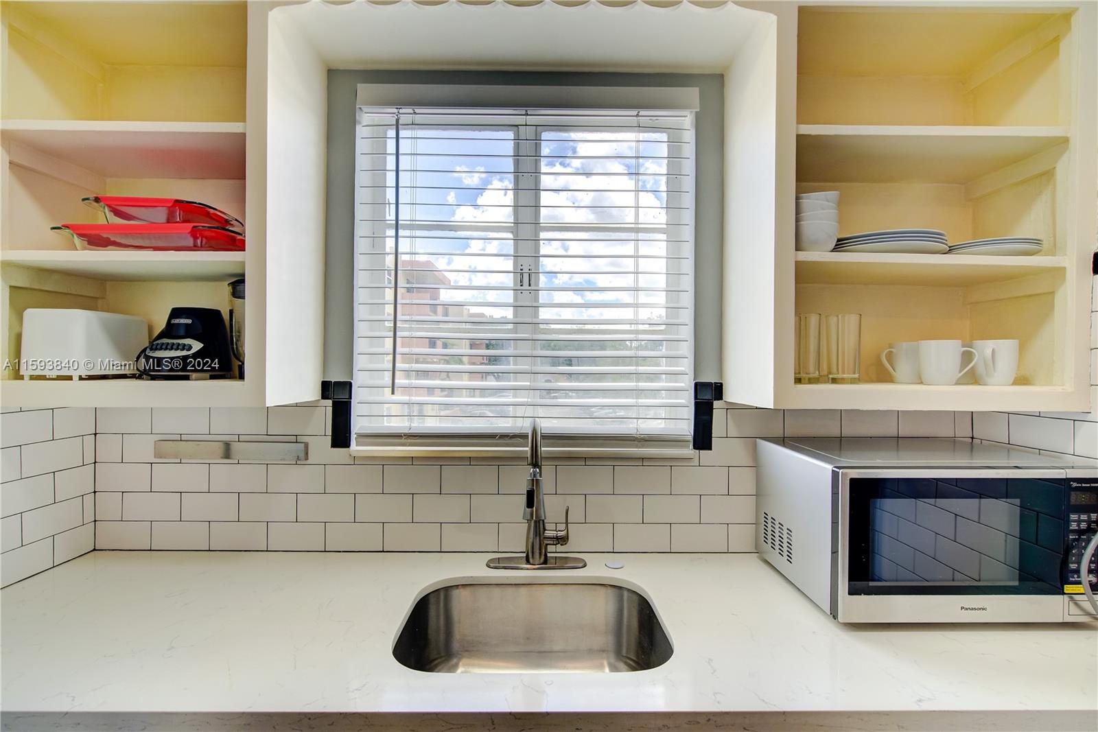 855 Southwest 7th Street Miami, FL 33130 - Photo 41 of 59 a kitchen with a sink and a window