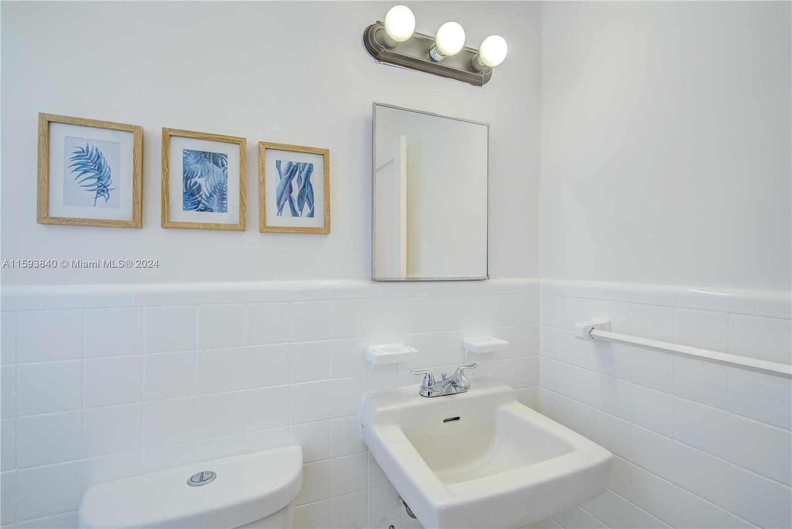 855 Southwest 7th Street Miami, FL 33130 - Photo 43 of 59 a bathroom with a bathtub and a sink