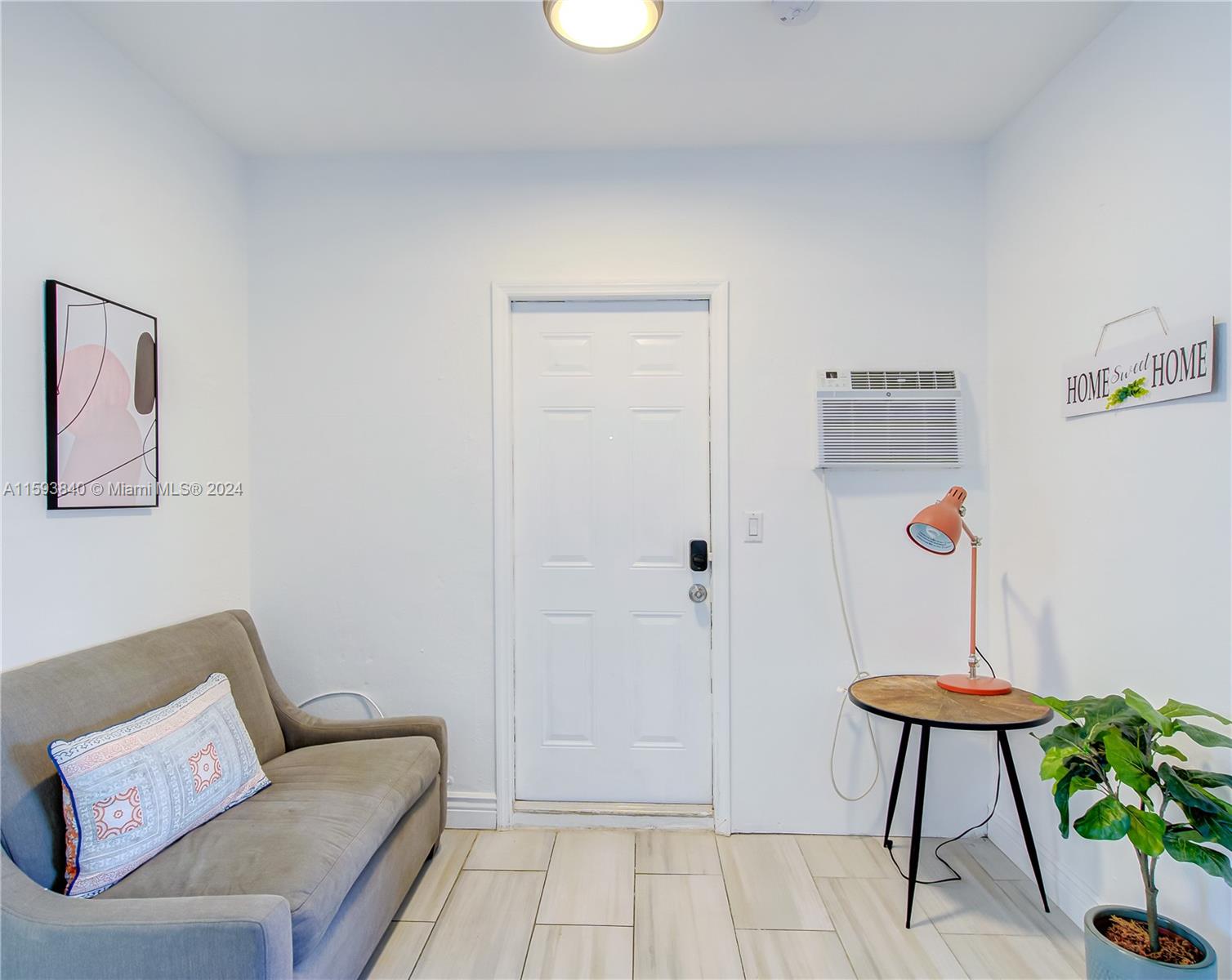 855 Southwest 7th Street Miami, FL 33130 - Photo 50 of 59 a living room with furniture and a potted plant