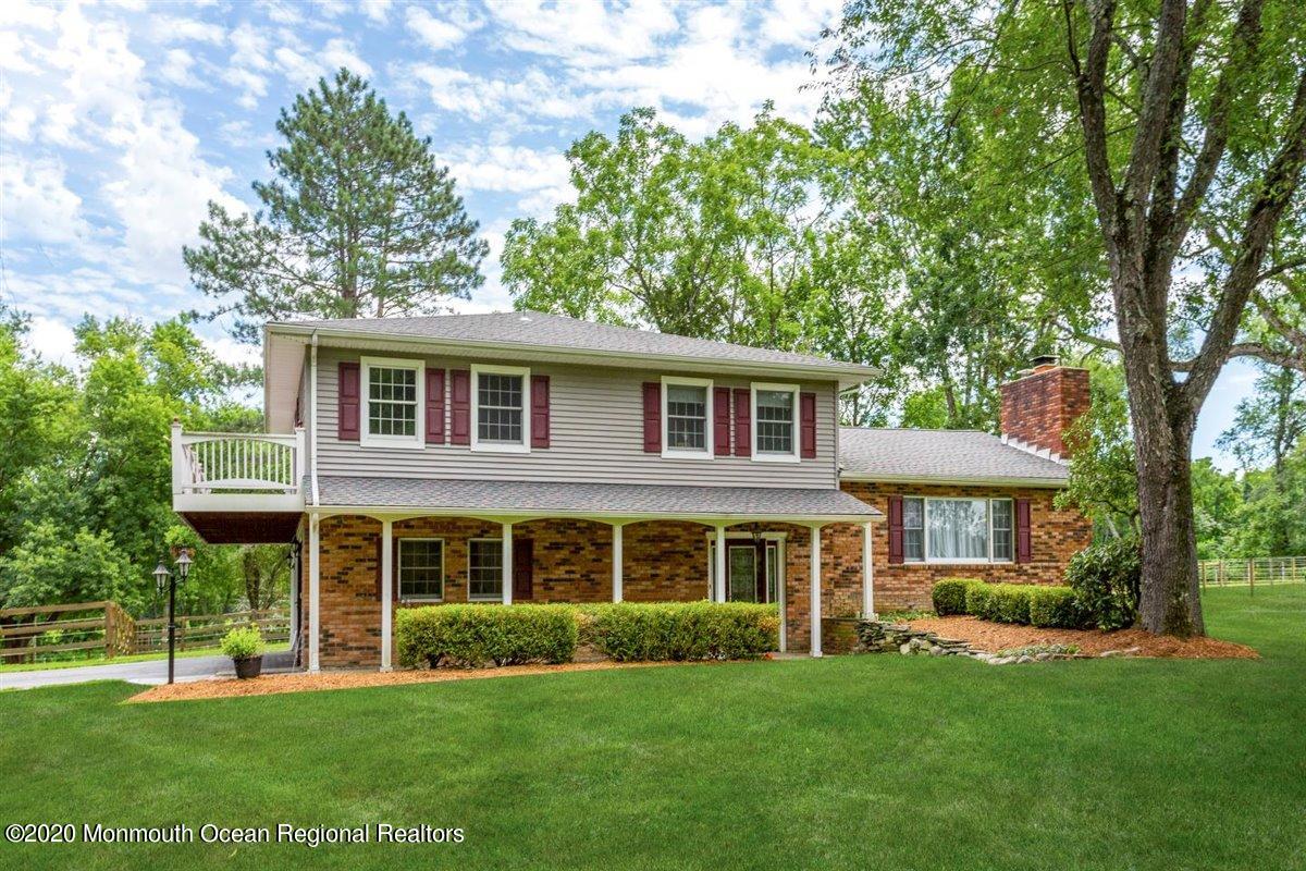 58 Ridge Road Branchville, NJ 07826 - Photo 1 of 51 a front view of a house with a yard