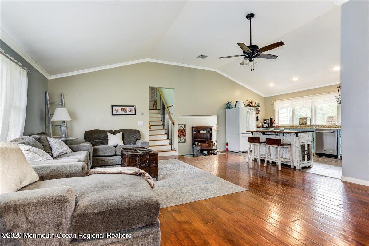 58 Ridge Road Branchville, NJ 07826 - Photo 11 of 51 a living room with furniture and a wooden floor