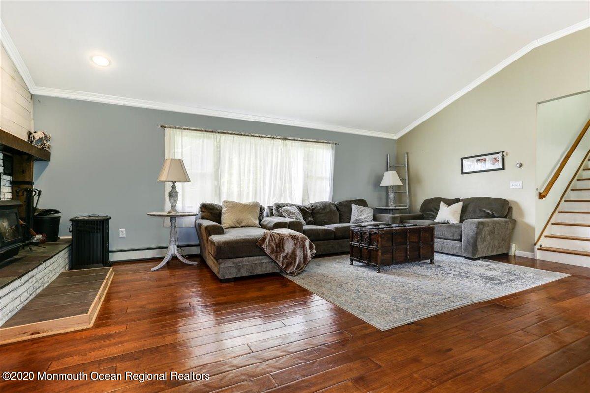 58 Ridge Road Branchville, NJ 07826 - Photo 12 of 51 a living room with furniture window and wooden floor