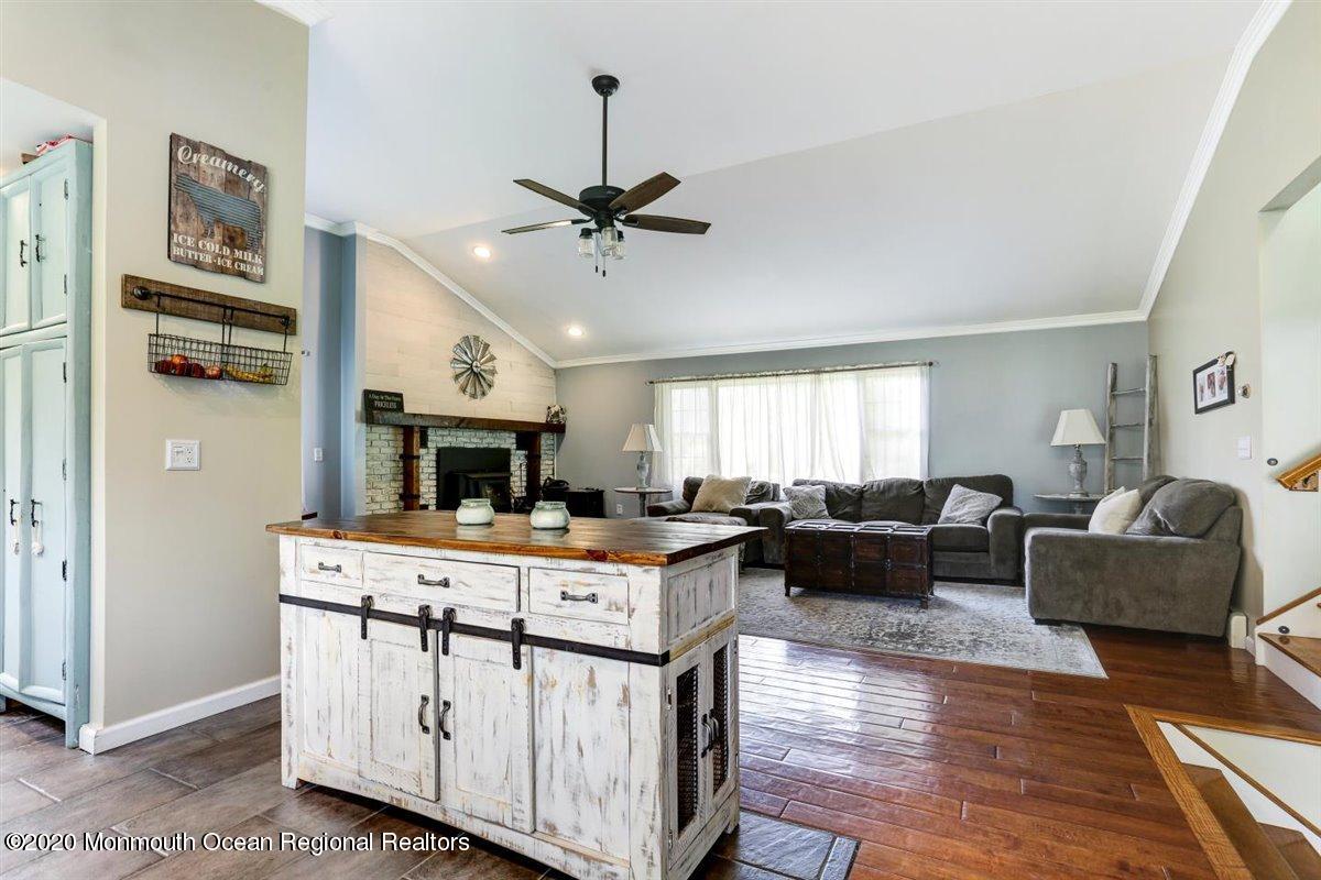 58 Ridge Road Branchville, NJ 07826 - Photo 18 of 51 a living room with furniture and a fireplace