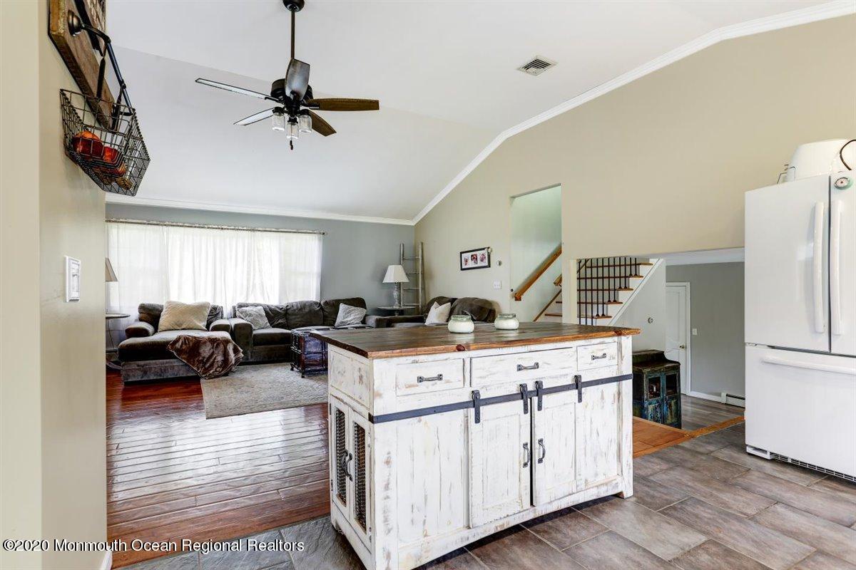 58 Ridge Road Branchville, NJ 07826 - Photo 20 of 51 a living room with furniture and a wooden floor