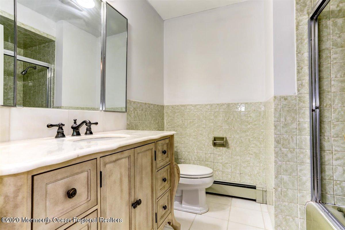58 Ridge Road Branchville, NJ 07826 - Photo 31 of 51 a bathroom with a sink toilet and shower