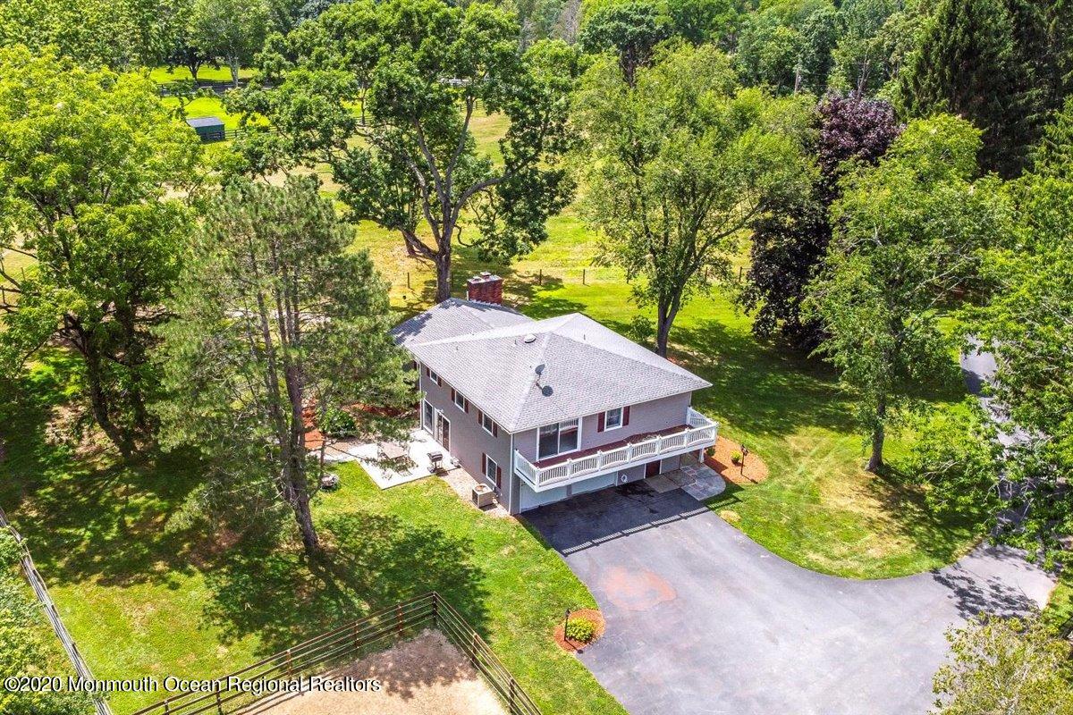 58 Ridge Road Branchville, NJ 07826 - Photo 45 of 51 a view of a house with a yard and large trees