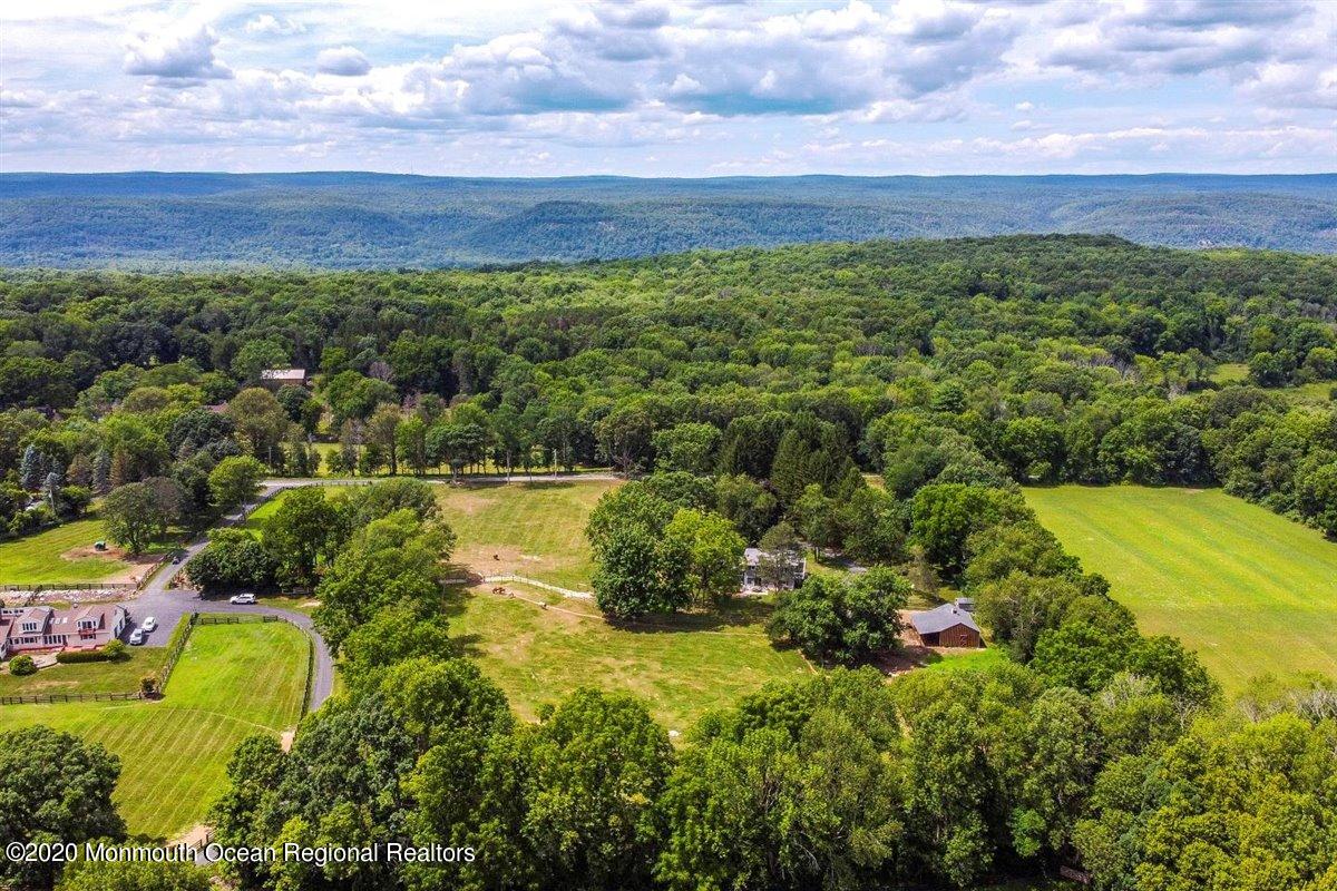 58 Ridge Road Branchville, NJ 07826 - Photo 50 of 51 a view of a lake with houses in the back