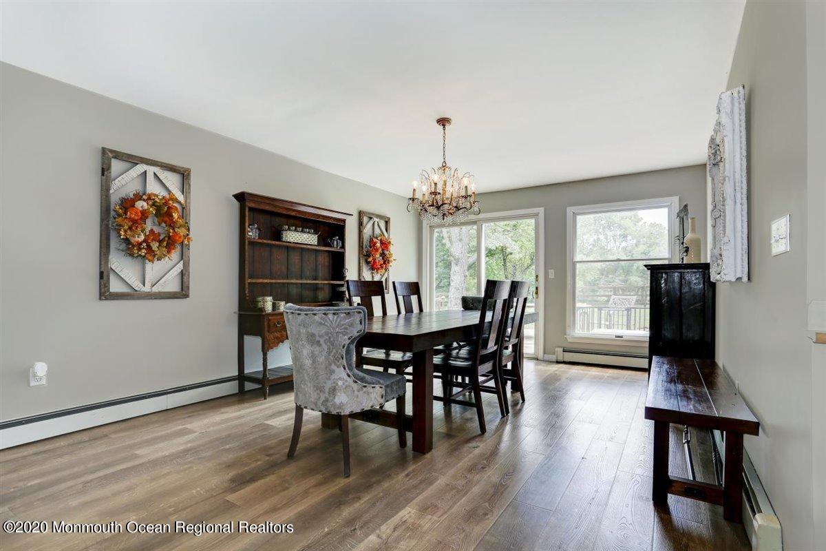 58 Ridge Road Branchville, NJ 07826 - Photo 6 of 51 a view of a dining room with furniture window and wooden floor