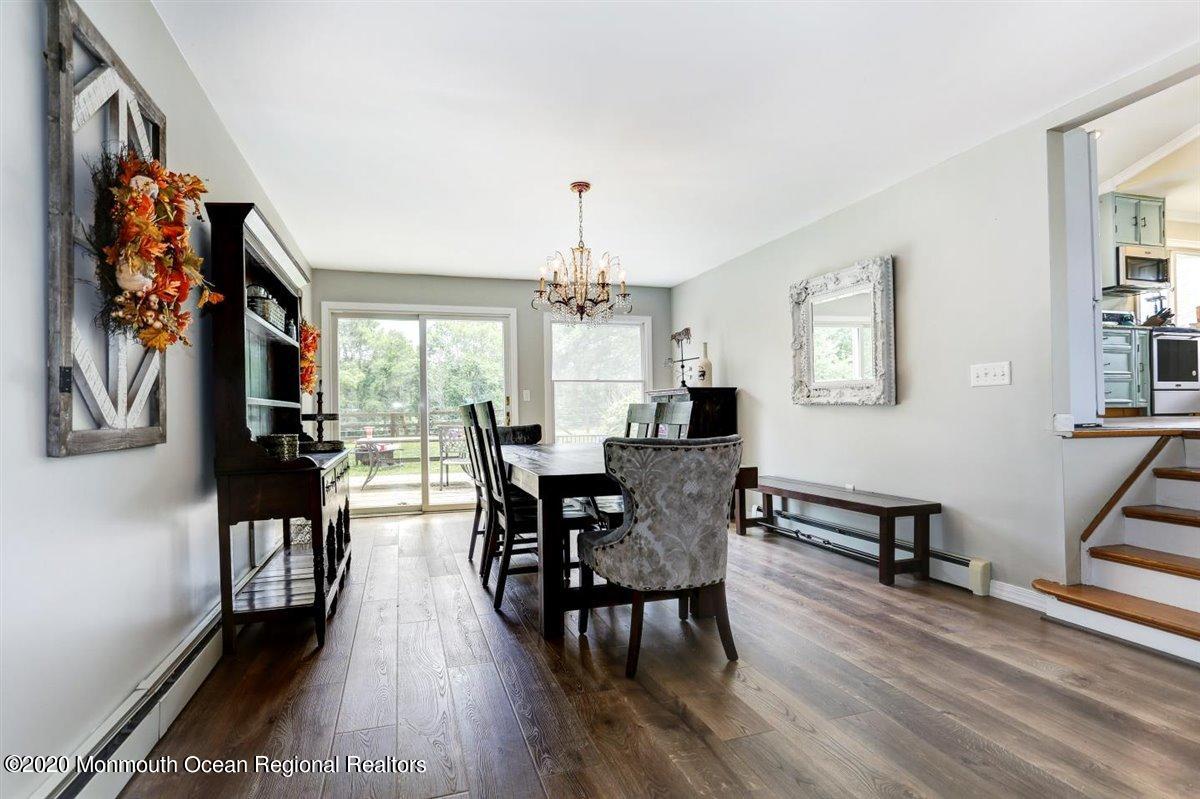 58 Ridge Road Branchville, NJ 07826 - Photo 7 of 51 a view of a a dining room with furniture window and wooden floor