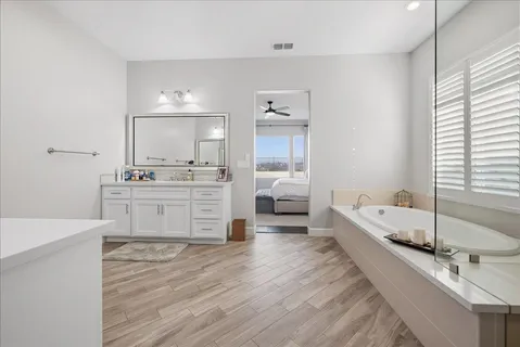 a view of a chairs and table in a room