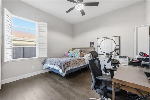 a view of house with swimming pool and furniture