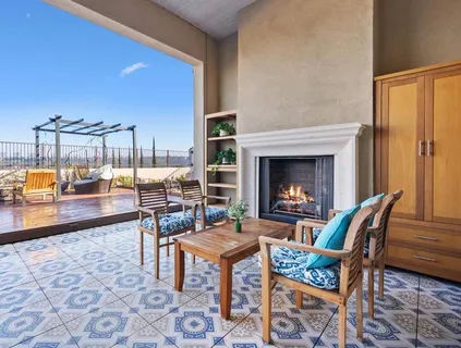 an aerial view of residential houses with outdoor space and street view