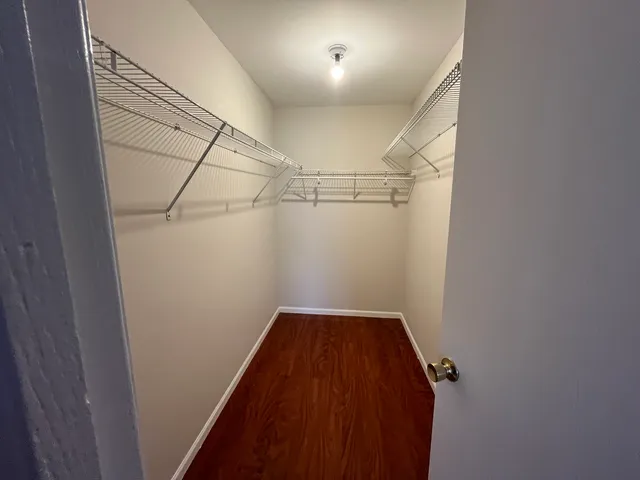 a view of a room with racks on the wall