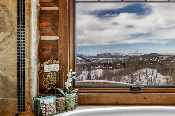 a view of balcony with furniture