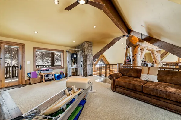 a bathroom with a sink mirror toilet and shower