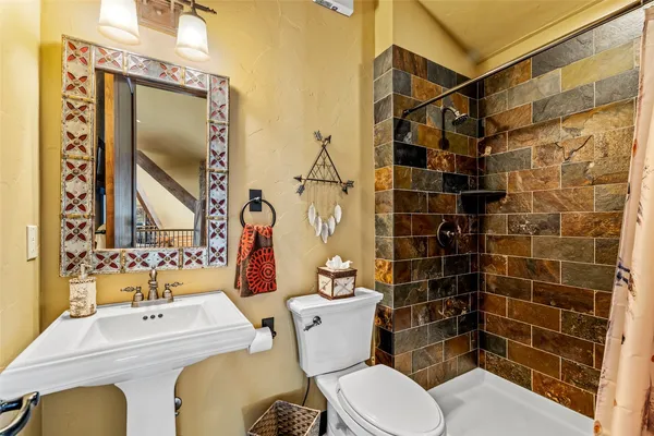 a bedroom with furniture and a bed