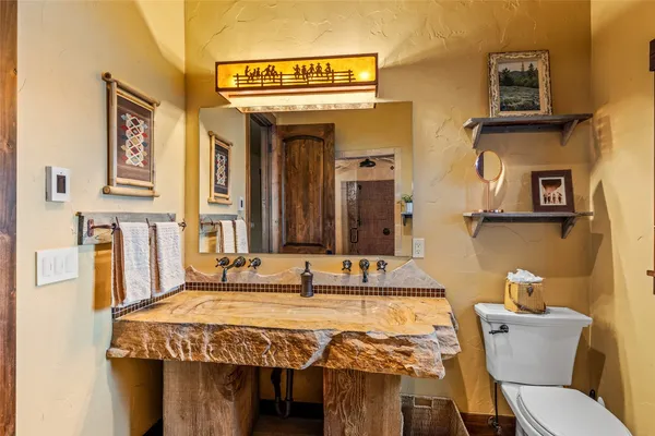 a bathroom with a bathtub and shower