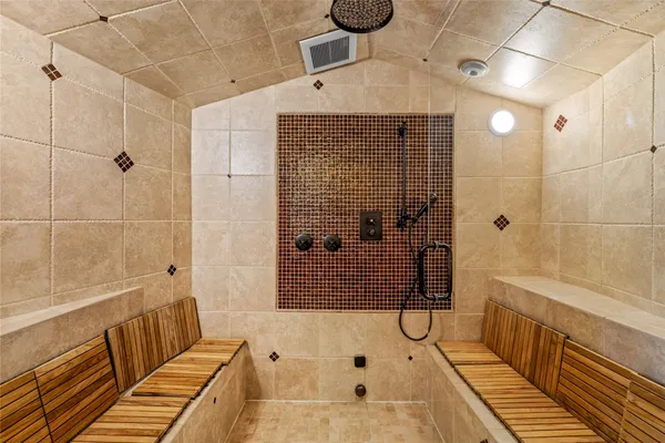 a outdoor living space with patio furniture and a ceiling fan