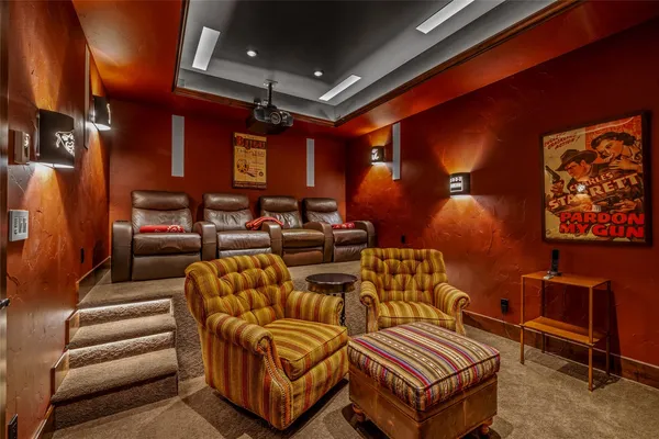 a living room with furniture a rug and a window