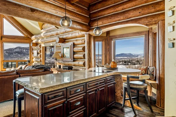 a kitchen with a stove and cabinets